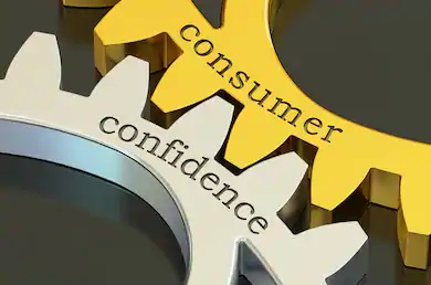 Two interlocking gears respectively labeled "consumer" and "confidence"