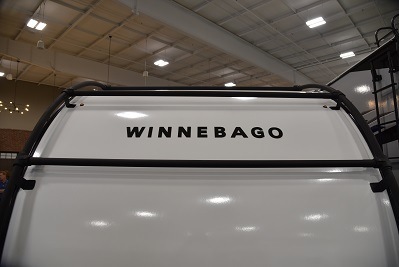 A picture of the back of a Winnebago RV that says, "Winnebago."