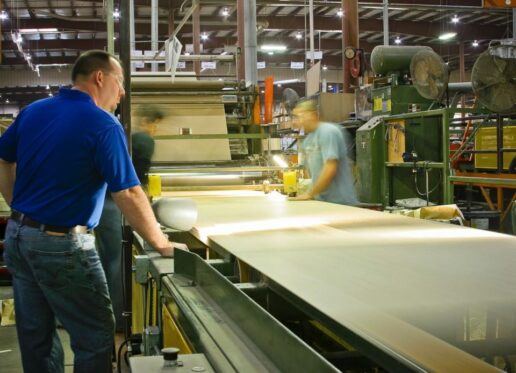 workers manufacture plywood at a patrick industries facility