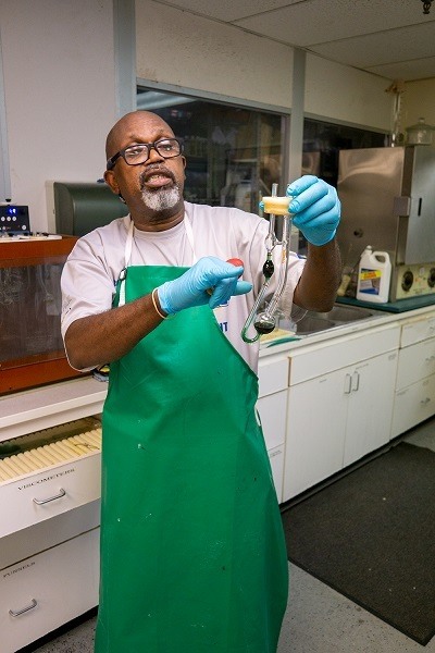 A picture of a Star brite employee doing product testing