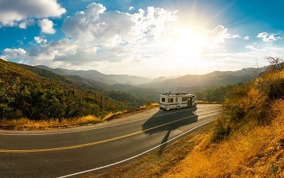 A picture of an RV on a road trip