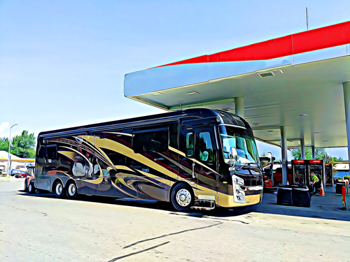 A picture of a Type A motorhome pulled up to the gas pump at a station