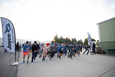 Jayco team members, family and friends begin the inaugural BlueJay 5K run on Nov. 6.