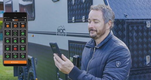 A picture of an RVer using the BMPro ProSmart phone app.