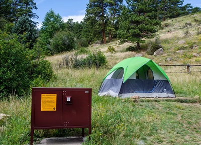 A picture of a tent set up in a campground at Rocky Mountain National Park, operated by the National Park Service.