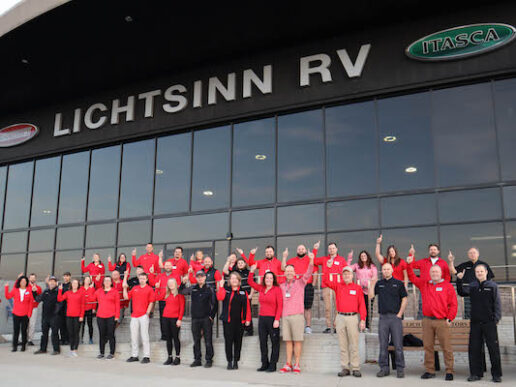 Lichtsinn RV's team members give a "number one" gesture
