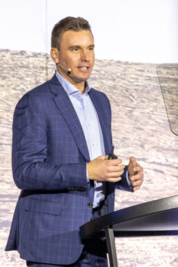 A picture of Jayco VP of Sales Nic Martin speaking at the 2022 Jayco Dealer Meeting in Nashville, Tennessee.