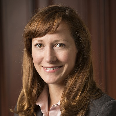 A headshot of Katherine Putsay Currie, the deputy infrastructure coordinator at the Interior Department