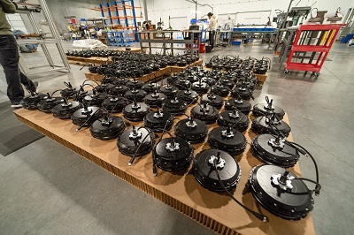 A picture of electric motors laid out on a table at the Linear Labs manufacturing plant in Texas
