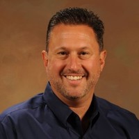 A headshot of Niles Whitehouse, the VP of sales and service for Winnebago motorhomes