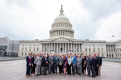 A picture of RV industry leaders in front of Capitol Hill at the 2019 RVs Move America Week event
