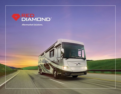 A picture of a motorhome driving down an empty road with the Red Diamond Aftermarket Solutions logo and words in the top left corner.