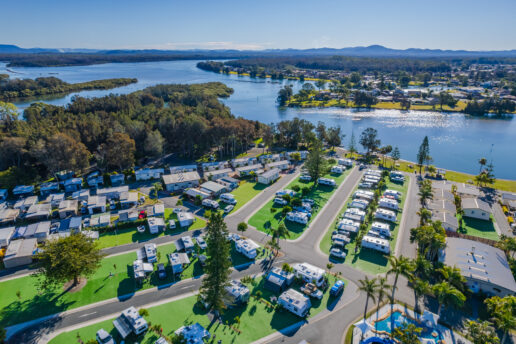 A picture of an RV park by the river in Michigan