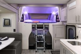 A picture of the overhead bunk in the 2022 Thor Motor Coach Mega C Inception 38MX