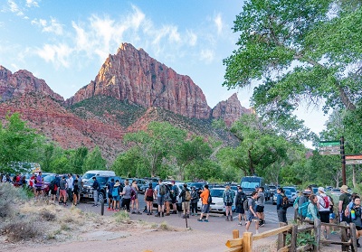 A picture of campers lined up outside Zion National Park Canyon on Memorial Day weekend 2021