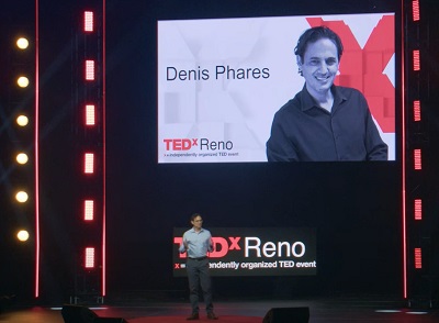 A picture of Denis Phares talking at TedxReno