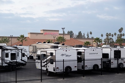 A picture of Richardson's RV exterior lot with a fence around it