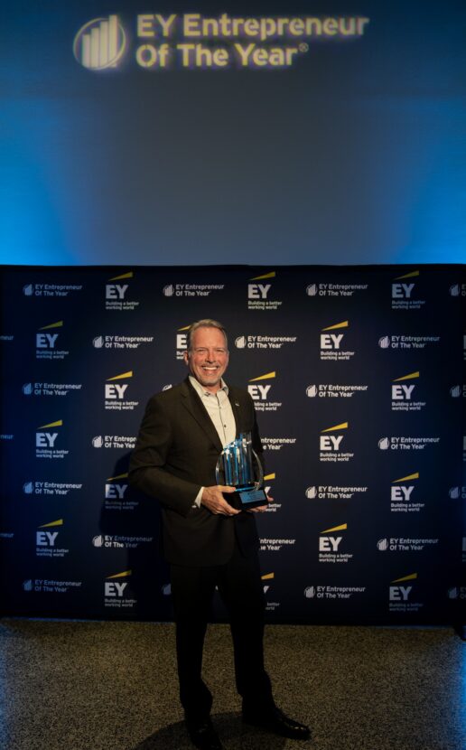 A picture of Shyft Group CEO Daryl Adams accepting an award