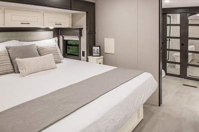 A picture of the bedroom in DRV Luxury Suites' new Italian white interior color