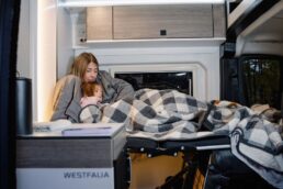 A picture of a family inside the Westfalia Wave.