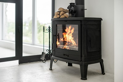 A picture of a stove with a fire in it