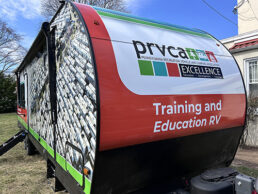 A picture of the front of the PRVCA technician training RV.