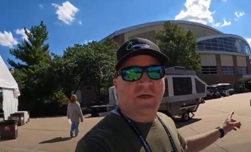 A picture of the Roaming Dad YouTube influencer providing viewers a tour of the opening day of the 2022 Hershey America's Largest RV Show