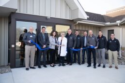 A picture of Jayco, Goshen Health and DJ Construction representatives at the Jayco employee health clinic ribbon-cutting
