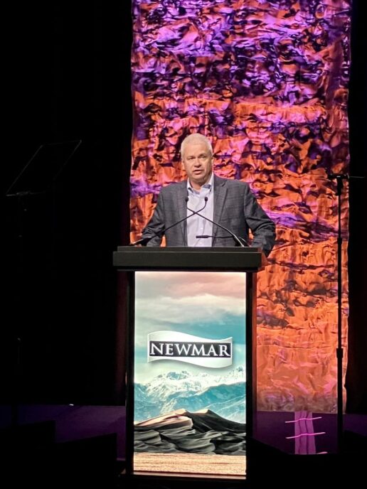 A picture of Newmar Vice President of Operations Kevin Bogan providing dealer with RV manufacturing updates at the 2024 Newmar dealer meeting.