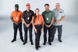 A picture of Lazydays sales and service rebranded uniforms.