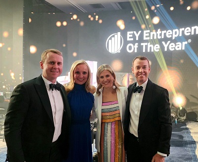 A picture of Ryan and Coley Brady, co-owners of Alliance RV, at the EY Entrepreneur of the Year award ceremony.