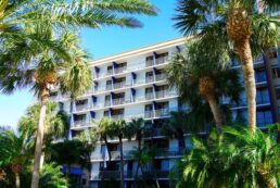 A picture of the Sheraton Sand Key Resort rooms from the outside.