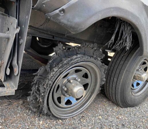A picture of a tire blowout on an RV.