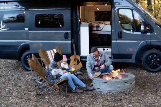A picture of a family outside the Westfalia Wave.