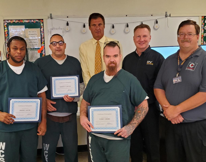 A picture of the first graduating class of RVTI trained service techs from the Worcester Correctional facility in Massachusetts