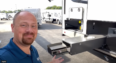 A picture of Josh the RV nerd touring a 2023 Forest River travel trailer