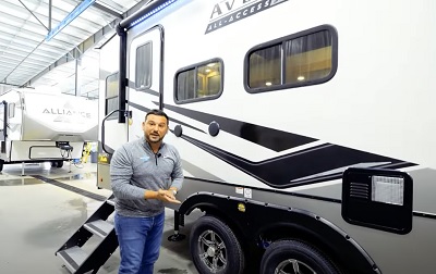 A picture of Alliance General Manager Ab Saleh with the Alliance Avenue (All Access) 22ML Fifth Wheel