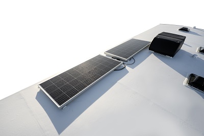 A picture of Starcraft Highland Ridge Open Range Solar Package shown mounted on the roof of an RV