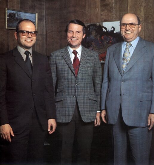 A picture of the Thetford family--three men in dark suits