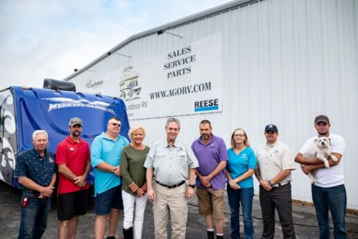 A picture of A Great Outdoor RV Center staff outside a dealership