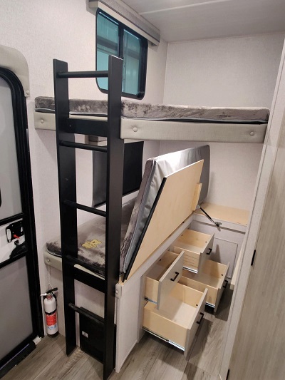 A picture of the East-to-West double over double bunks with wardrobe