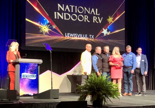 A picture of the 2023 National Indor RV Centers awards winners at the Newmar Awards dinner 2023