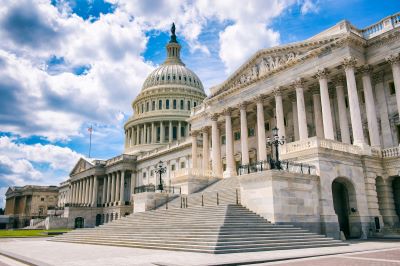 A picture of Capitol Hill in Washington, D.C. with a brilliant blue sky filled with fluffy clouds in the background