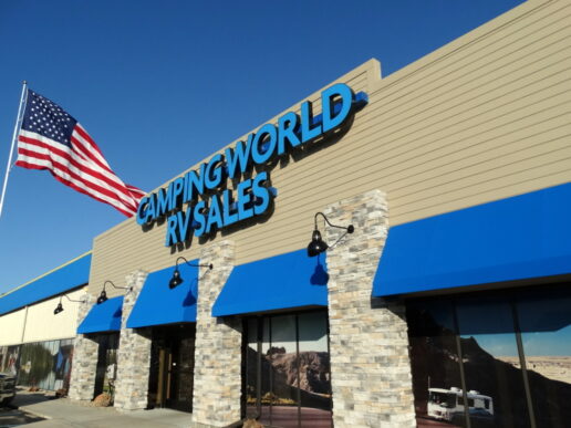 A picture of an Indiana Camping World storefront with a blue sign and blue awnings
