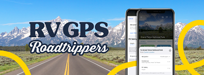 A picture of an open road with an overlay of the words "RV GPS" and a person holding a cell phone in the foreground with the Roadtrippers RVGPS app on it