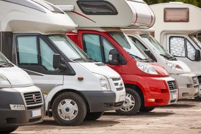 A picture of several Type C RVs lined up in a row