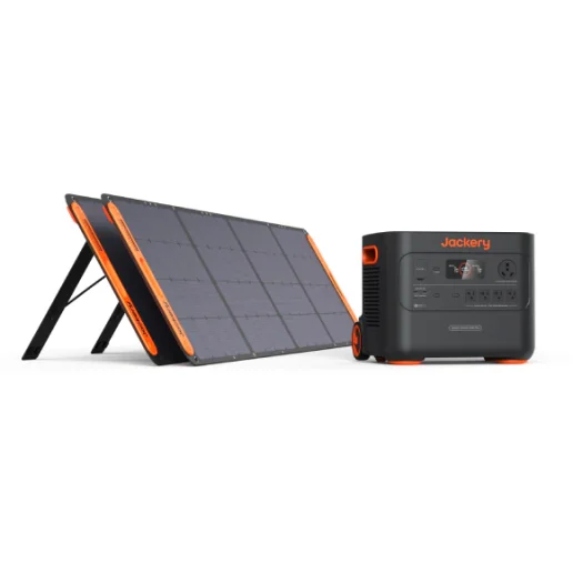 A picture of the Jackery 2000 Plus Solar Generator next to two solar panels