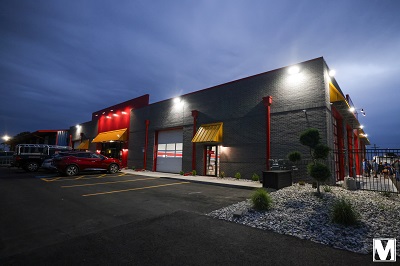 A picture of Moix RV's new service center building at night