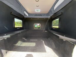 A picture of the interior of a 2023 Soaring Eagles Camper OV-X truck camper.