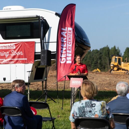 A picture of General RV Center President Loren Baidas addressing a crowd gathered for the groundbreaking of a new dealership store in Salisbury, North Carolina.